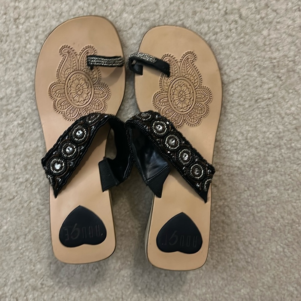 Woman is black size 8 wedge sandal
